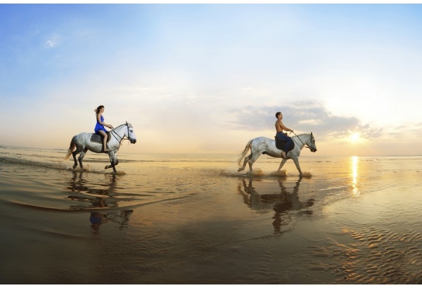 Romantic riding near the seaside