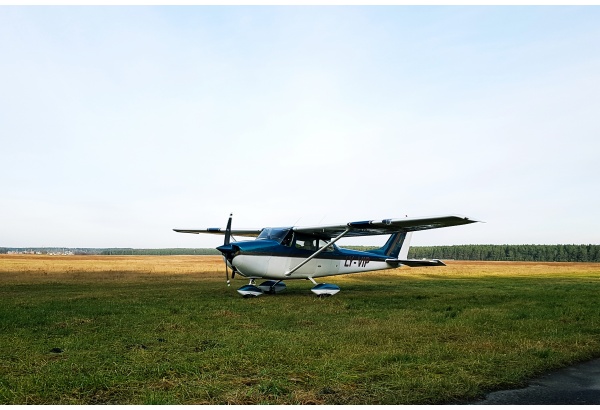 Flight over the lake Alaušas in Utena